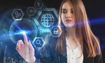 Business, Technology, Internet and network concept. Young businessman working on a virtual screen of the future and sees the inscription: Customer engagement