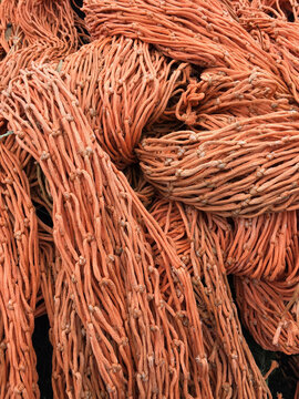 Close up of piles of commercial fishing nets