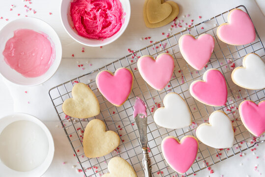 Heart-shaped valentine cookies with pastel glazing