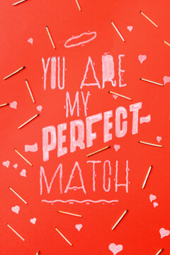 Text ""you are my perfect match"" on red backgorund with bunch of fire matches.