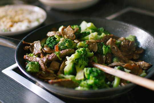 Asian beef with broccoli and mushrooms