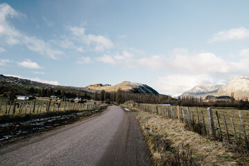 Dirt road going through rugged country in Patagonia Chile