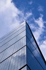 Fototapeta na wymiar Corporate building and sky reflection detail