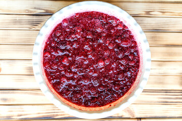 mixed with sugar fresh juicy ripe raspberries should give juice before pouring into cans