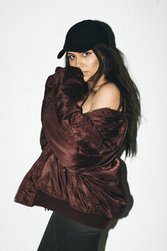 Woman in Hat & Bomber Jacket