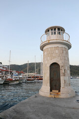 Fototapeta na wymiar lighthouse in Marmaris marina, Turkey