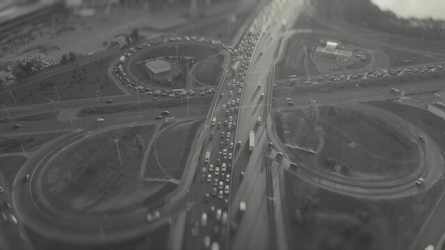 Top View Of A Traffic Intersection, At Rush Hour, Black And White Video With Tilt Shift Effect