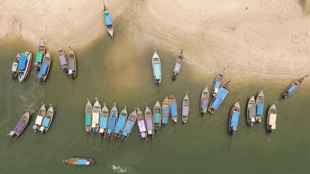 Aerial view from drone, Thai fishing boat used as a vehicle for finding fish in the sea, Thailand