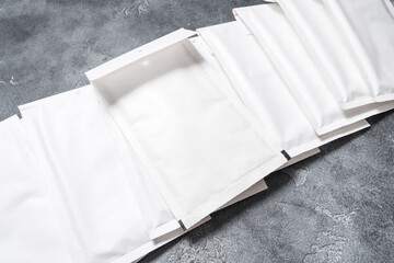 Set of white paper bubble envelopes for postal shipping