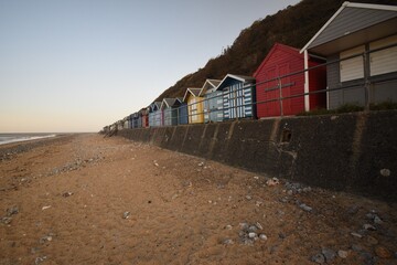 Fototapeta na wymiar Pretty beach huts on Cromer beach, North Norfolk, England