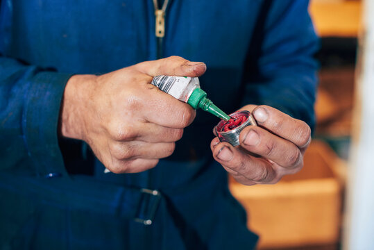Hand details of mechanic