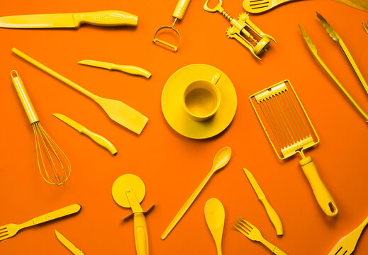 Kitchen objects on orange backgorund