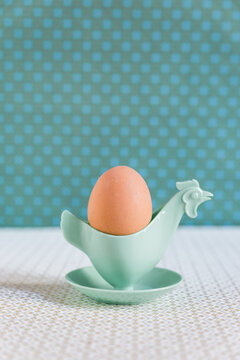 Vintage eggcup in form of chicken and egg