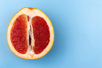 Grapefruit on a blue table