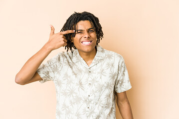 Fototapeta premium Young african american rasta man showing a disappointment gesture with forefinger.