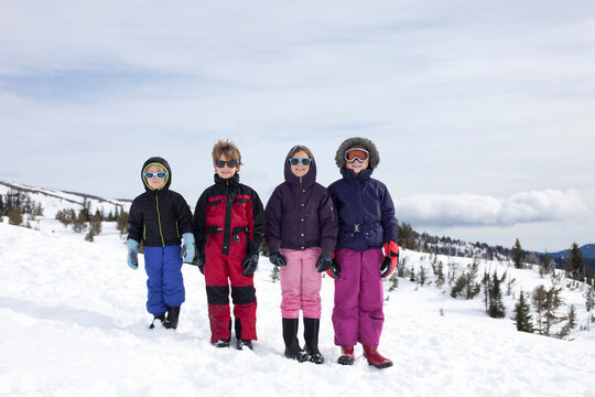Four siblings in the snow on Mount Hood