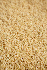 Dry Brown Rice background, low angle view.