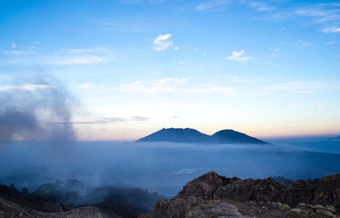 Beautiful landscape of Kawah Ijien volcano, East Java Indonesia. Misty morning in the mountains