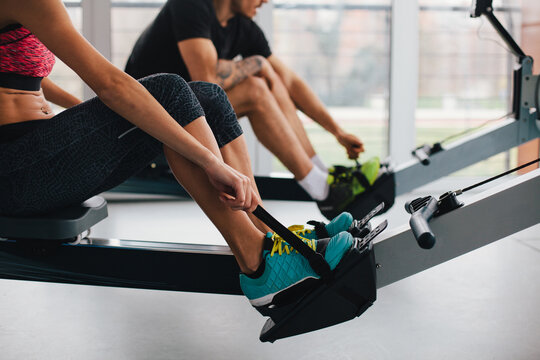 Man and woman working out in the gym