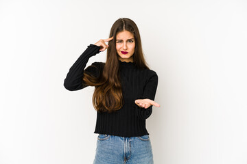 Young caucasian woman isolated on white background holding and showing a product on hand.