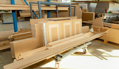 In the warehouse of the woodworking production there are wood blanks