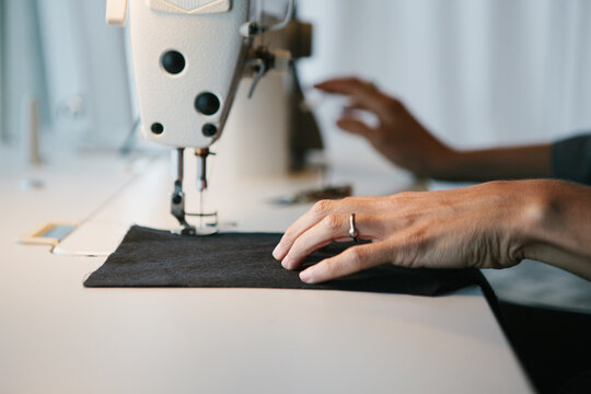 Woman Using Sewing Machine
