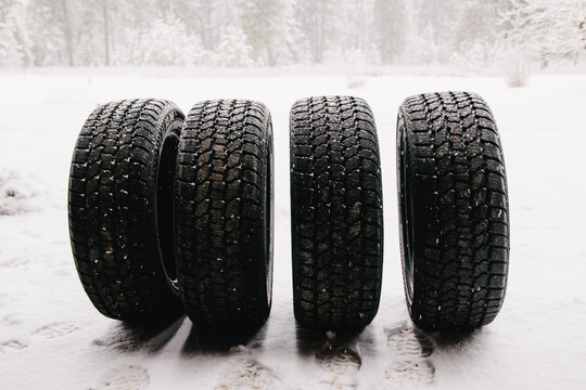 Set of four studded snow tires