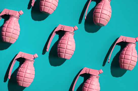 Organised pink had grenades on blue background.