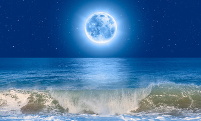 Naklejka na ściany i meble Full moon rising over empty ocean at night, power sea wave in the foreground
