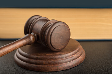 Gavel and sounding block close up. Wooden hammer. Justice and law concept.