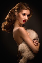 Portrait of sexy brunette woman wear fur