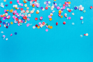 confetti on blue background, color background