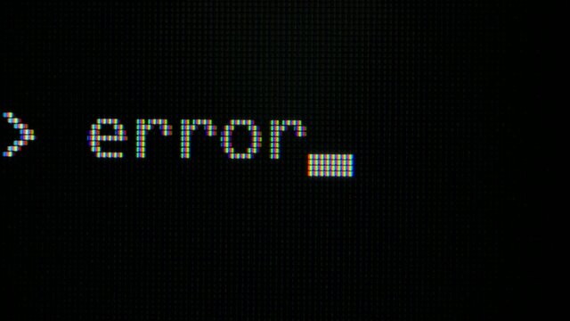 Command line with word Error typed on computer screen closeup . Macro detail shot monitor pixels. Pixels zoomed in with white glowing crystals on a black background.