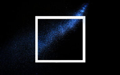 Creative frame concept with neon blue glitter splash trail on black background. Minimal flat lay...