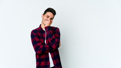 Young caucasian man isolated on white background laughing happy, carefree, natural emotion.