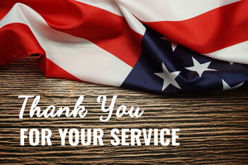 Fototapeta na wymiar Thank You for your service text messege and USA flag. American holiday background