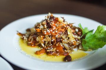 Food concept. Soup, chicken, salat on wooden table