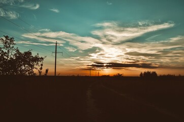 wind turbines at sunset