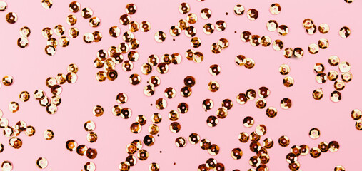 Banner of Golden sparkles on pink pastel background. Festive backdrop for your projects