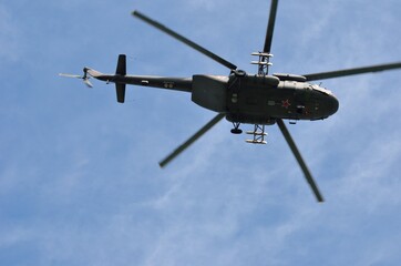 Holiday on May 9, Victory Day. Flying helicopter over the houses. The city of Murmansk.