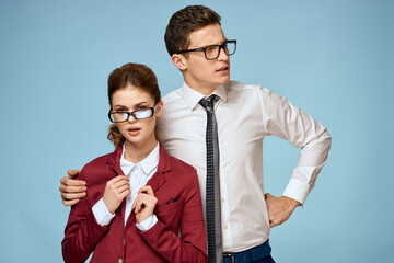 business man and woman office officials communication work colleagues studio blue background