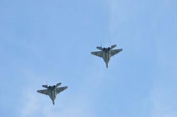 Holiday on May 9, Victory Day. Fighter flight over houses. The city of Murmansk.