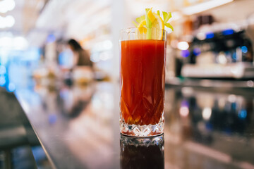 Tomato alcohol cocktail served on bar counter