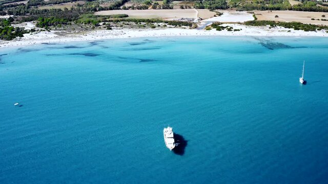 Aerial Drone View over La Cinta Beach, San Teodoro, Emerald Coast, Sardinia, Italy.
Caribbean Cristal Clear Turquoise Water.