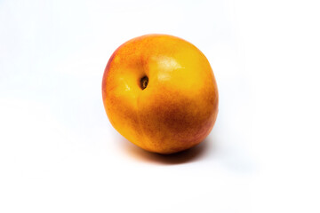 Beautiful nectarine of yellow color on white isolated background