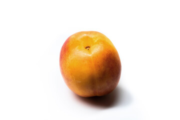 Beautiful nectarine of yellow color on white isolated background