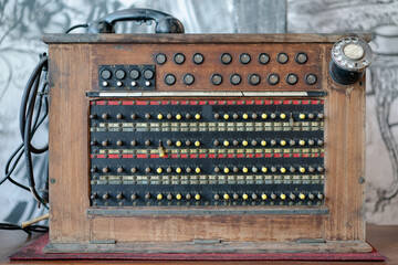Historical, telecommunications system. Old vintage telephone switchboard.