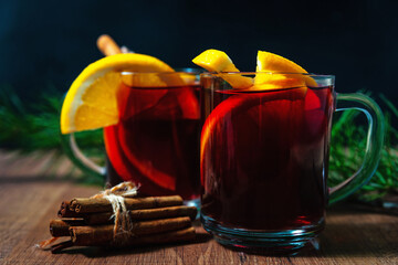 Fragrant mulled wine with orange pieces and spices