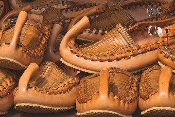 Traditional handmade souvenir from Serbia - ethnic leather shoes called opanak (opanci)