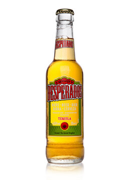 LONDON, UK - JANUARY 02, 2017: Bottle of Desperados beer on black background, lager flavored with tequila is a popular beer produced by Heineken and sold in over 50 countries.